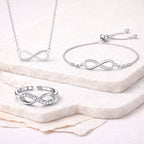 Nilu's Collection Silver Plated Infinity Pendant With bracelet ad finger Ring For Women And Girls