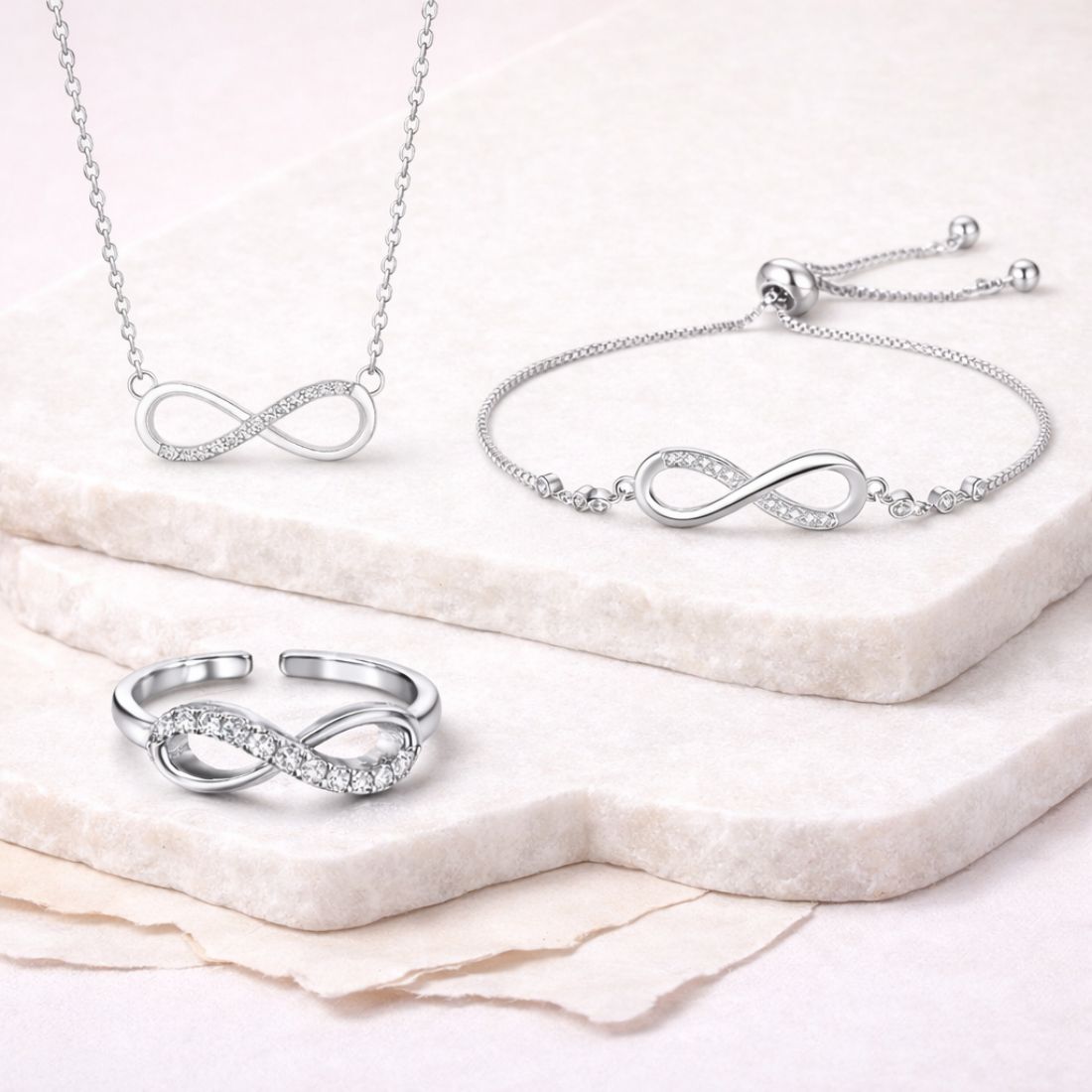 Nilu's Collection Silver Plated Infinity Pendant With bracelet ad finger Ring For Women And Girls